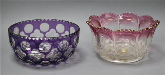 An amethyst overlaid bowl and a cranberry style bowl largest diameter 21cm